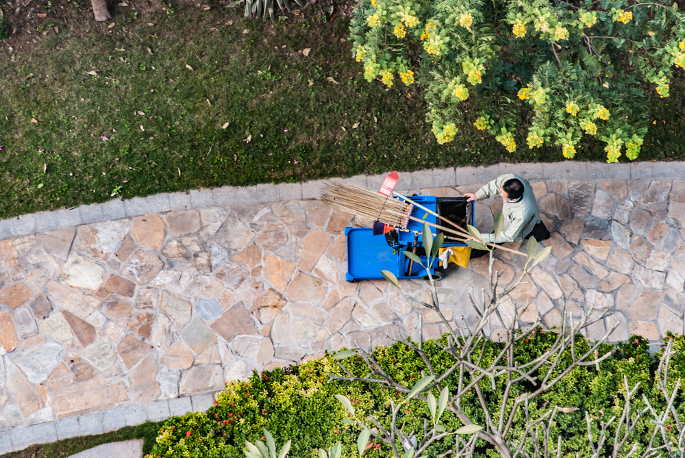 garbage,man,,road,man,cleaning,city,street,with,broom,tool,